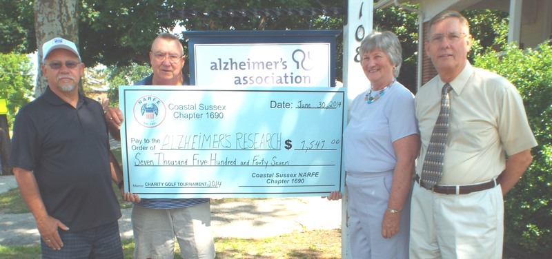 Attending a check presentation of $7,547 for Alzheimer’s research from the Coastal Sussex 1690 Chapter of NARFE at the Sussex County office of the Alzheimer’s Association in Georgetown are (l-r) Ron Weber, NARFE chapter golf tournament chair; Dick Oliver, NARFE chapter Alzheimer’s Committee chair; Jamie Magee, Sussex County coordinator for the Alzheimer’s Association; and Larry Trombello, NARFE chapter president. SOURCE SUBMITTED